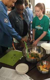 Food corps learning how to cook