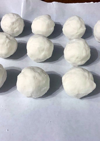 New bath bombs sitting on parchment paper